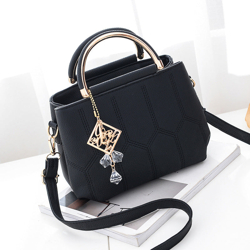 Embroidered shoulder bag