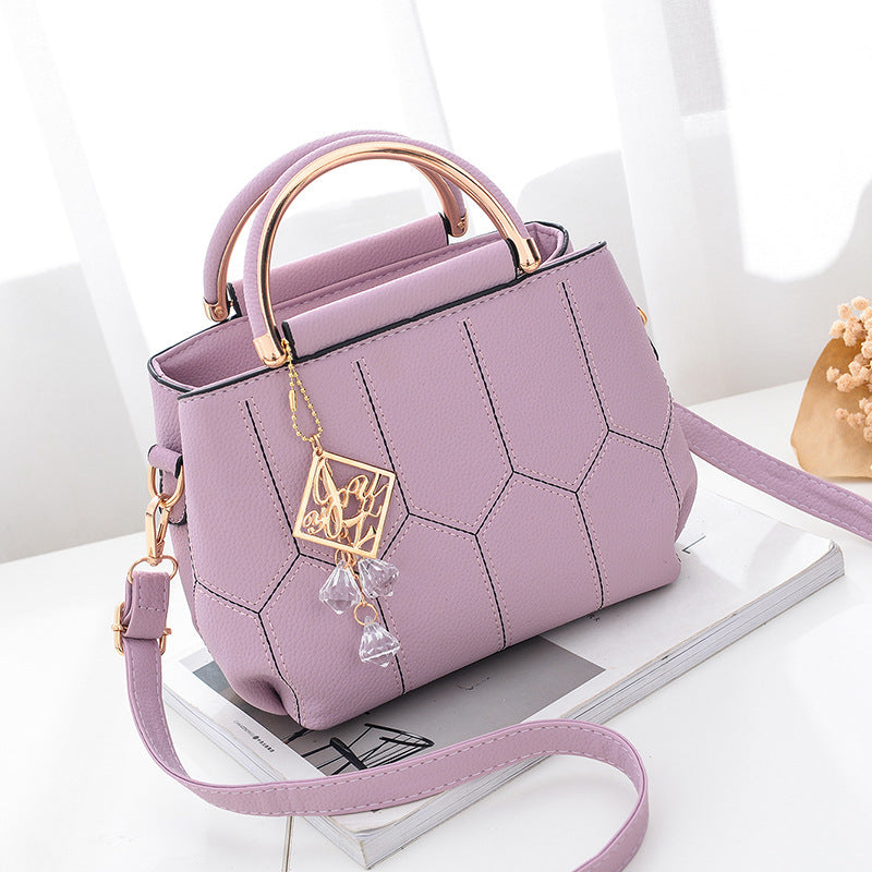 Embroidered shoulder bag