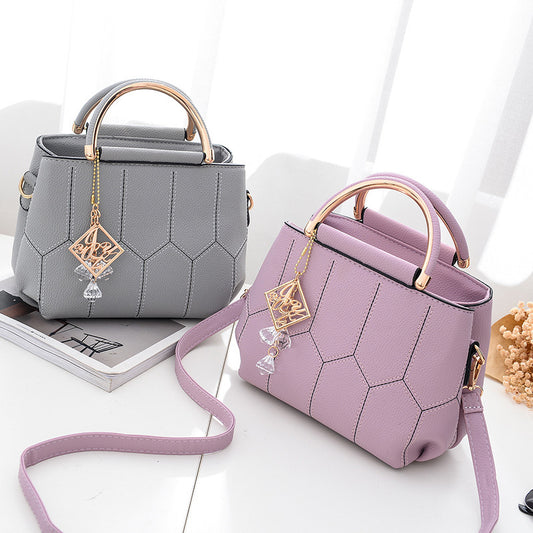 Embroidered shoulder bag