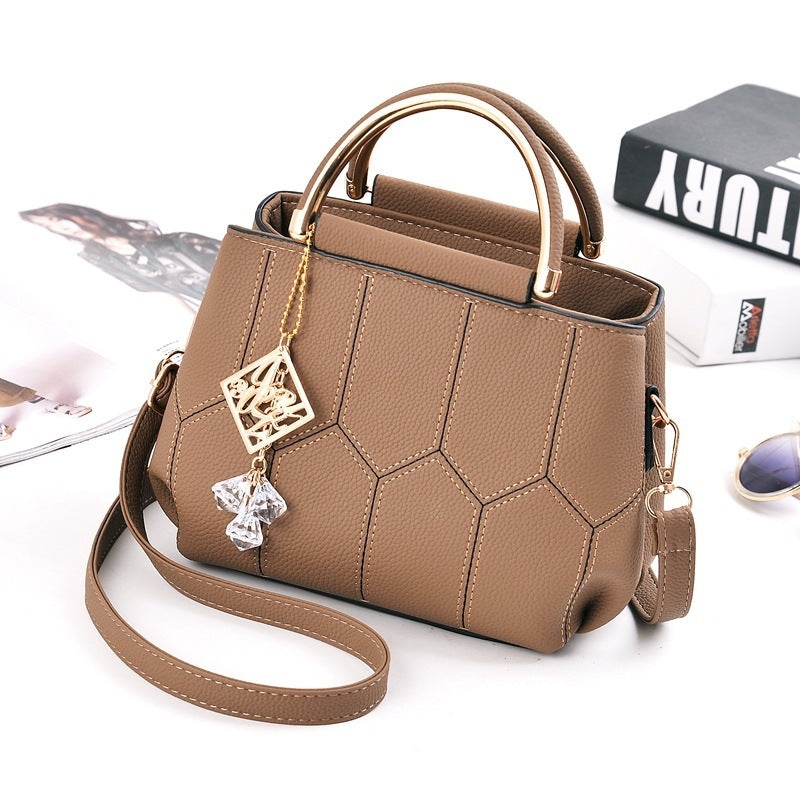 Embroidered shoulder bag