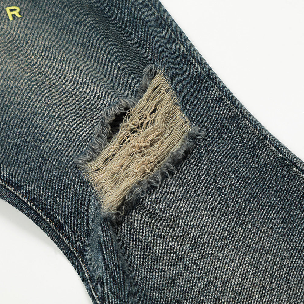 Embroidery Hole Slightly Flared Jeans Men