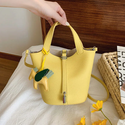 Popular and popular lychee patterned mother and child bucket bag for women, 2025 new casual retro handbag, casual commuting bag