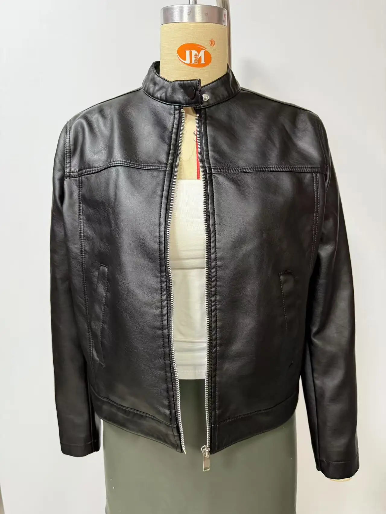 Black Women's Fitted Leather Jacket with Front Zipper & Side Pockets‌, Available in Brown, Navy Blue, and Beige.
