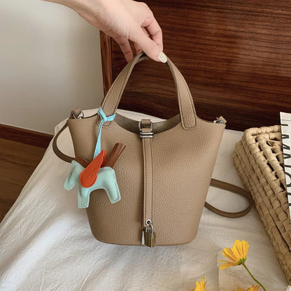 Popular and popular lychee patterned mother and child bucket bag for women, 2025 new casual retro handbag, casual commuting bag
