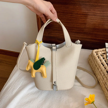Popular and popular lychee patterned mother and child bucket bag for women, 2025 new casual retro handbag, casual commuting bag