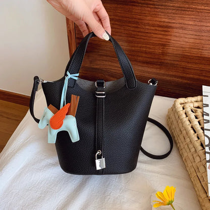 Popular and popular lychee patterned mother and child bucket bag for women, 2025 new casual retro handbag, casual commuting bag