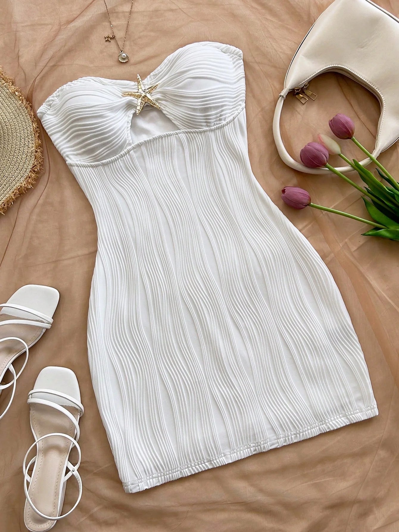 A sexy, pure and sensual, slimming, strapless and body-hugging dress