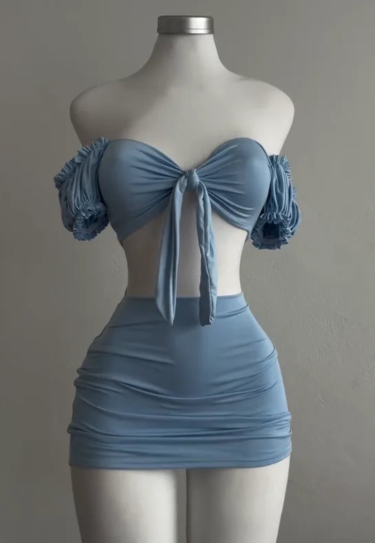 A sexy and fashionable two-piece short skirt with hollowed-out pleated puffed sleeves that wraps the hips