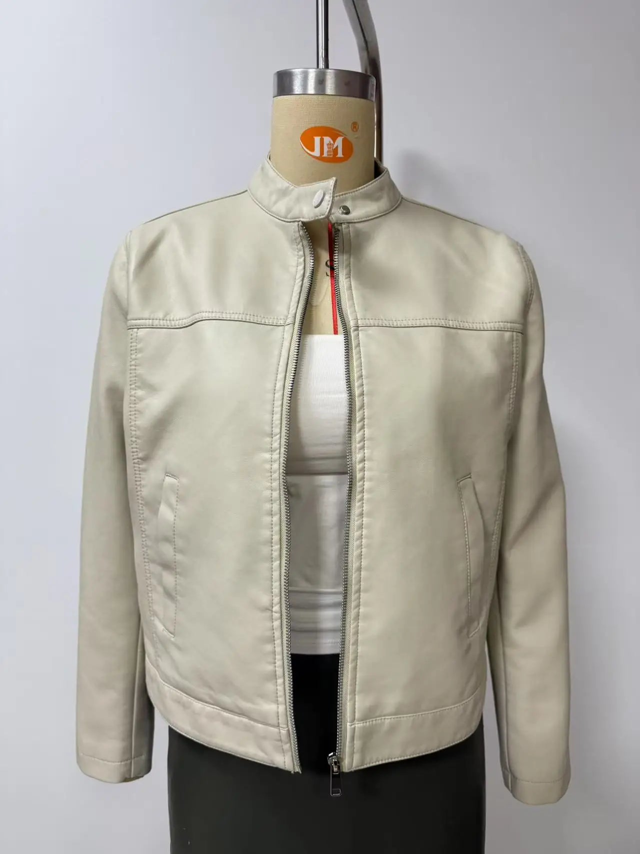 Black Women's Fitted Leather Jacket with Front Zipper & Side Pockets‌, Available in Brown, Navy Blue, and Beige.