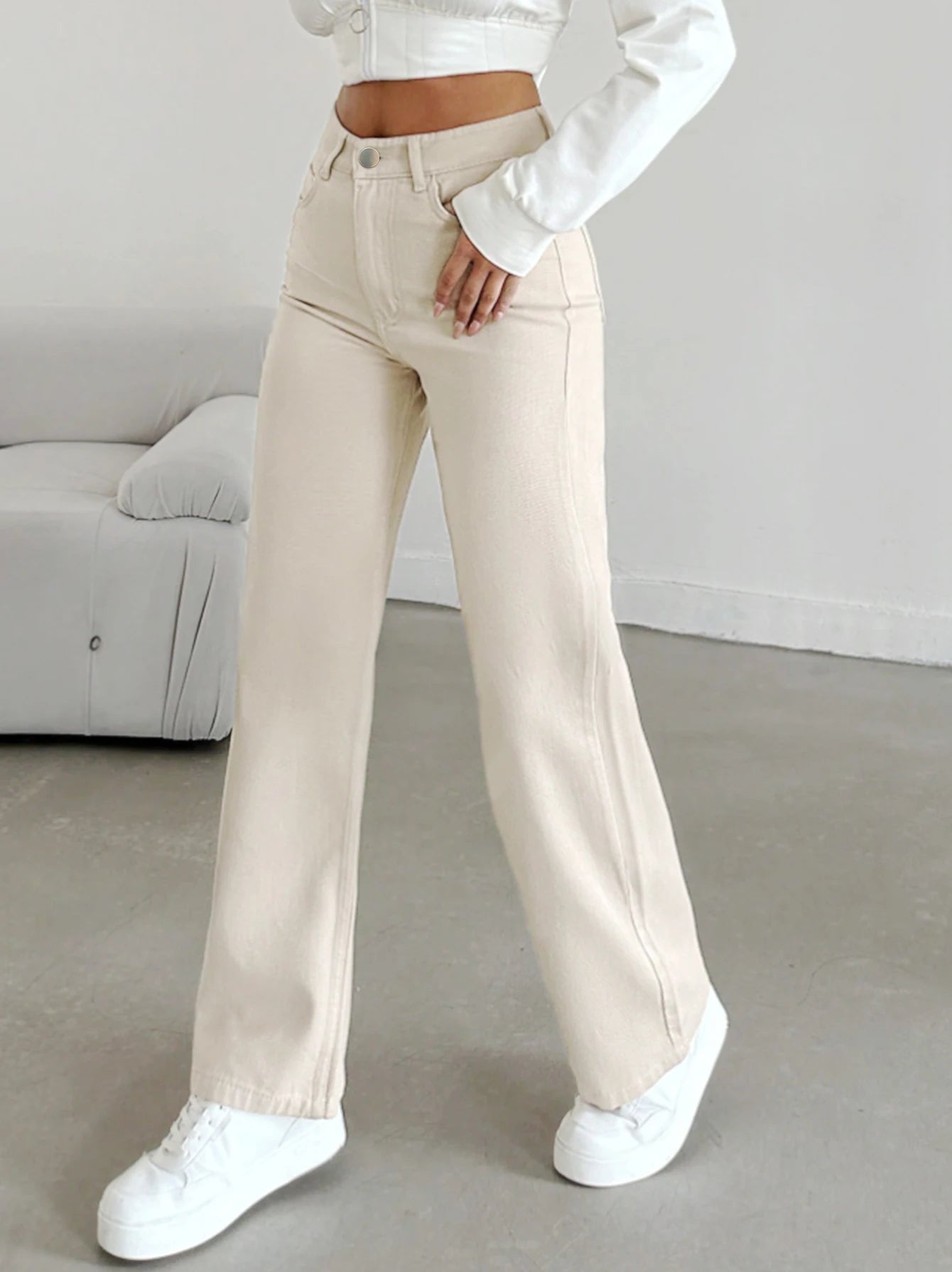 Women's autumn jeans, made of cotton denim, in a beige apricot color, straight-leg, slim fit, high-waisted, elastic waistband