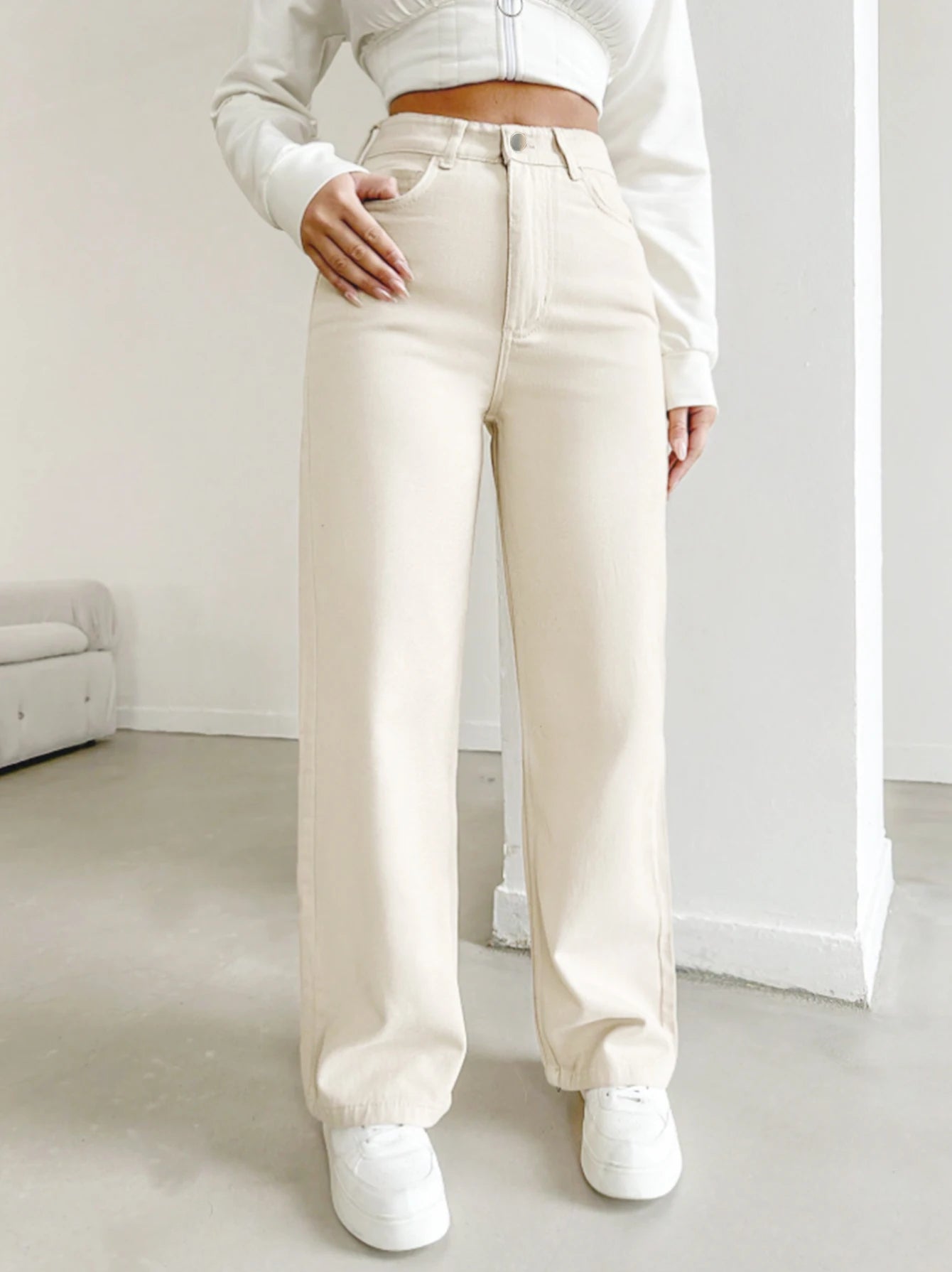 Women's autumn jeans, made of cotton denim, in a beige apricot color, straight-leg, slim fit, high-waisted, elastic waistband