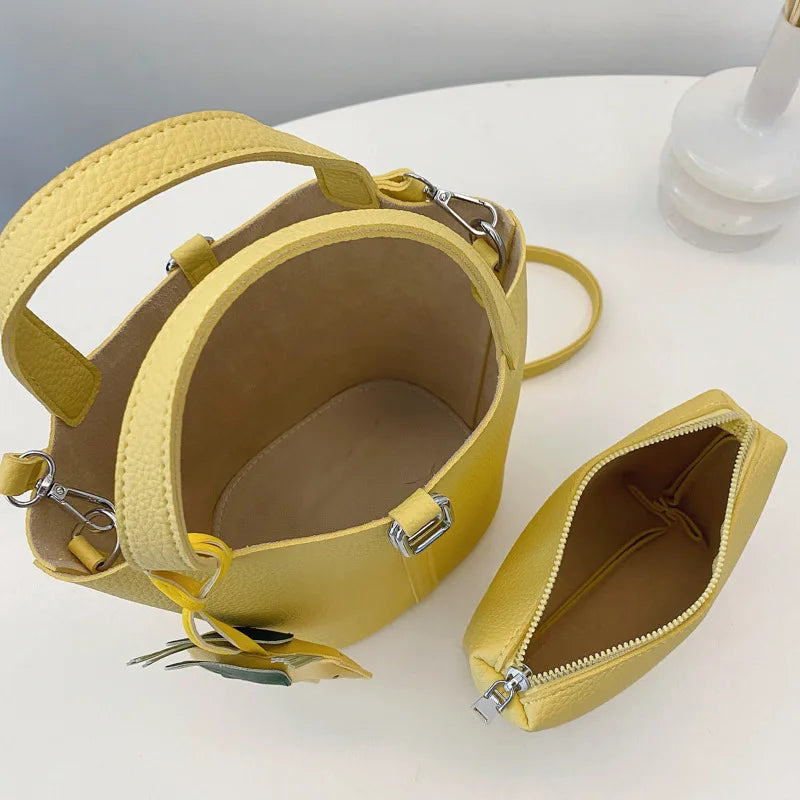 Popular and popular lychee patterned mother and child bucket bag for women, 2025 new casual retro handbag, casual commuting bag