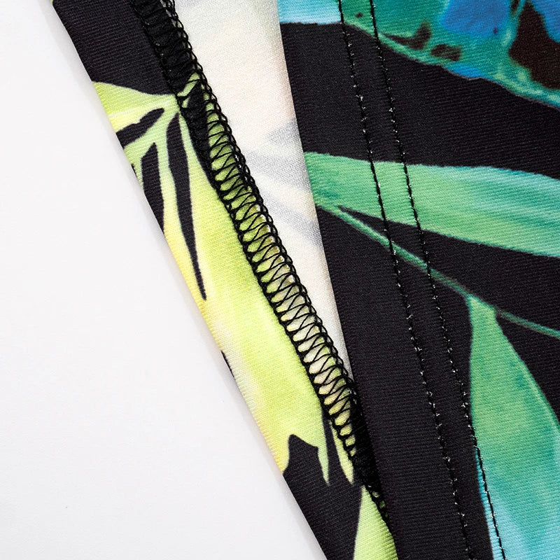 CUTENOVA Women'S V-Neck Tropical Botanical Print Hanging Neck Tie Backless Slim Flare Jumpsuit Fashion Elegant Street Jumpsuit