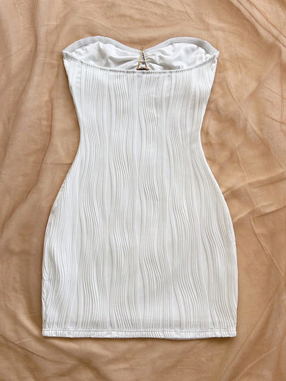 A sexy, pure and sensual, slimming, strapless and body-hugging dress