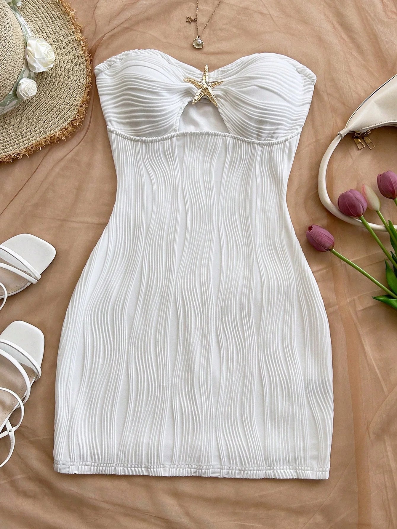 A sexy, pure and sensual, slimming, strapless and body-hugging dress