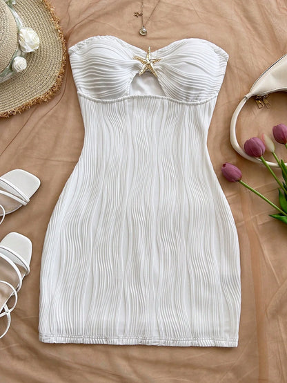 A sexy, pure and sensual, slimming, strapless and body-hugging dress